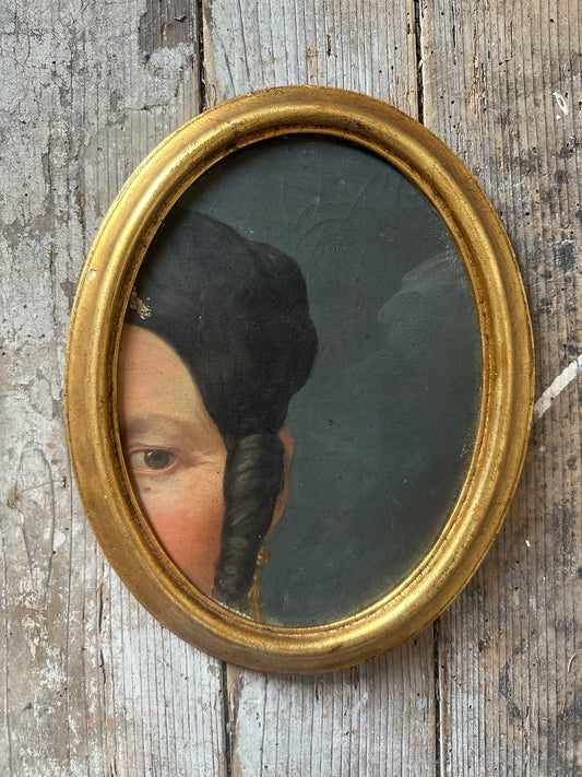 Regard et boucle d’oreille